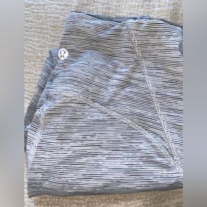 Lululemon 3/4ths leggings in Wee are from Space Nimbus Battleship print